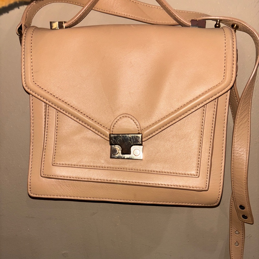loeffler randall purse new with tags, slight scratches to hardware as seen above